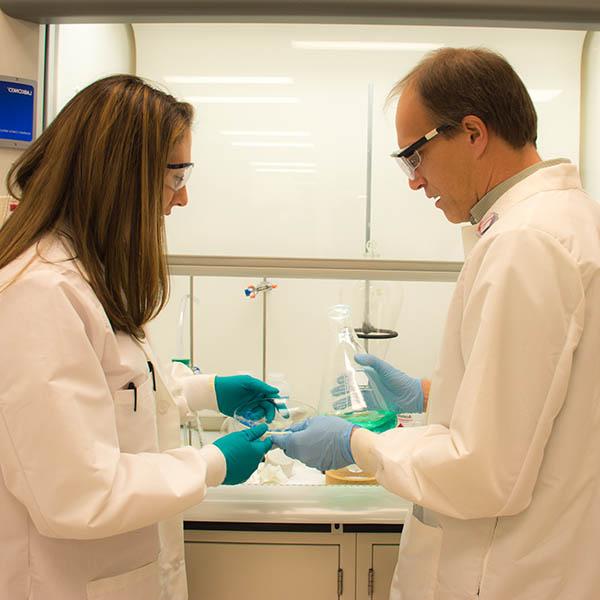 Faculty in Mines radiochemistry lab